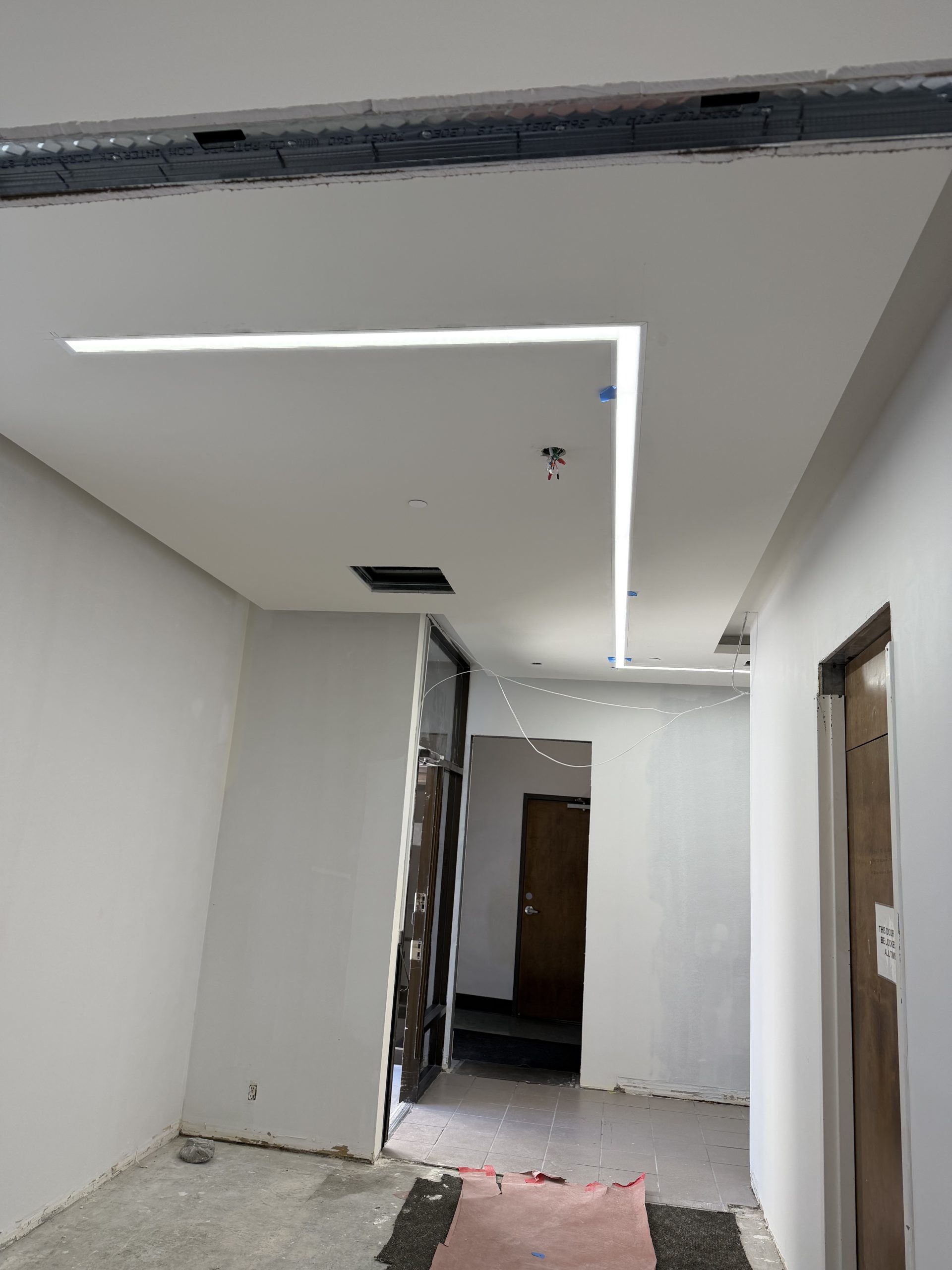 Architectural linear LED lighting installation — commercial build